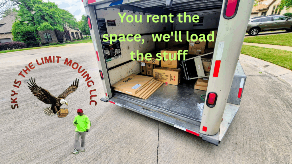 Sky Is The Limit Moving crew loading furniture and boxes into a customer's trailer with professional care and efficiency in Texas