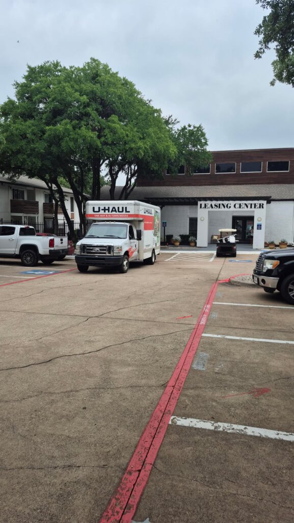 Bedford TX movers loading a moving truck outside an apartment for a residential move